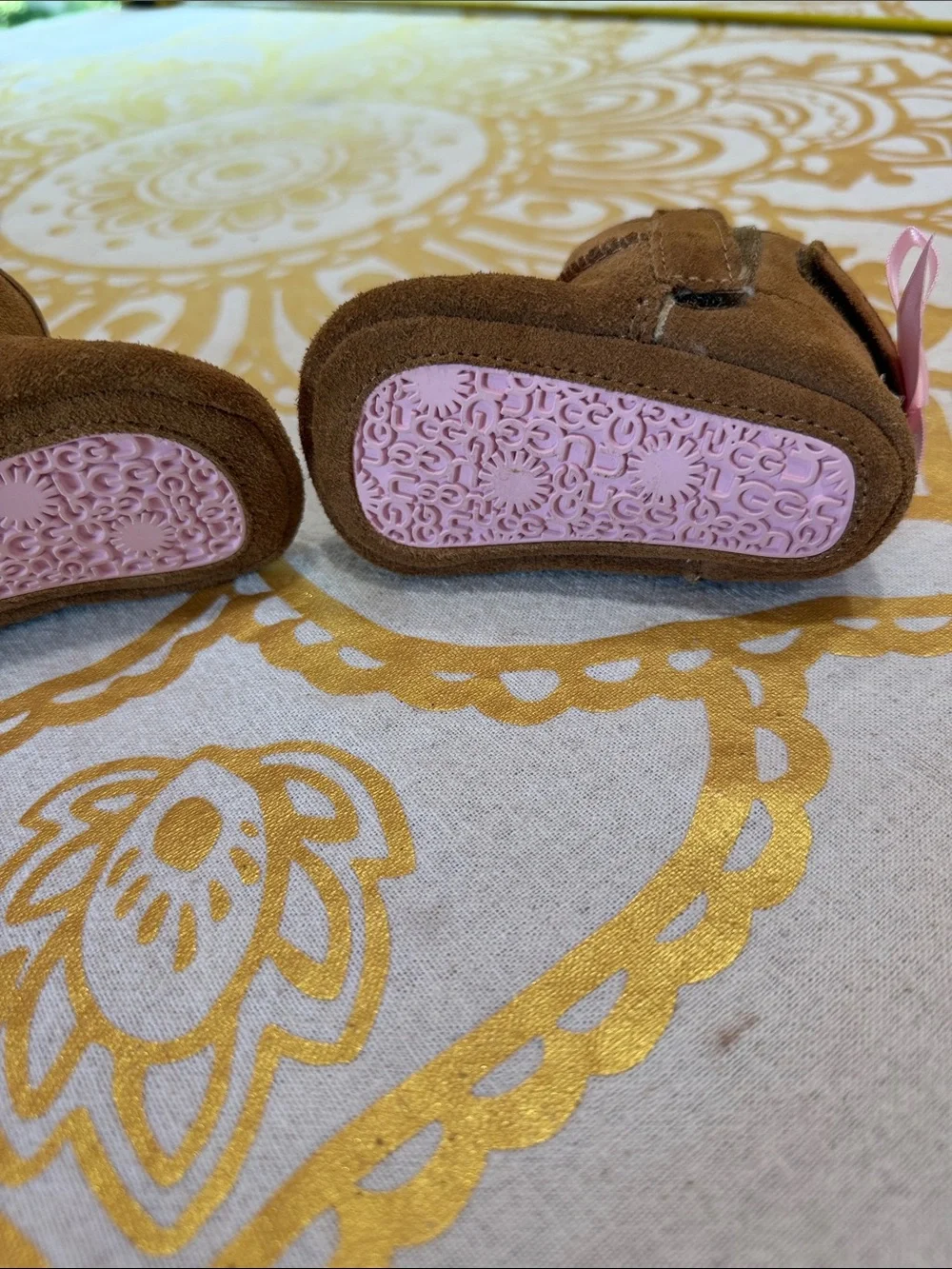 UGG Kids Brown Shearling Boots with Pink Ribbon